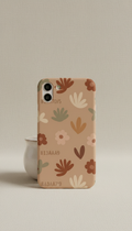 Toasted Almond Minimal Floral boho retro phone case, Default angle is a clean three-quarter shot from slightly above,...