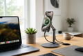 SnapStation MagSafe adjustable desk stand holding iPhone in portrait mode on a minimal home office desk